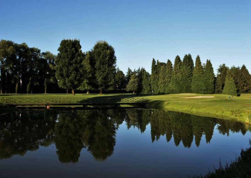 Monticello Golf fairway view with water hazard