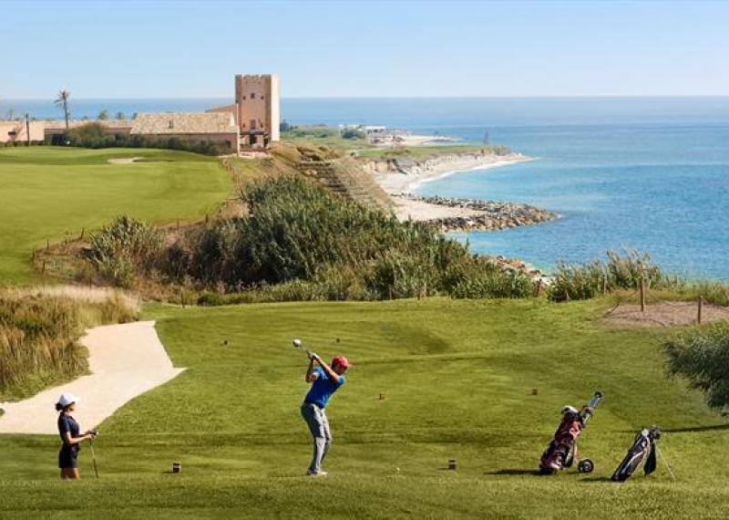 players at verdura resort with sea in the background